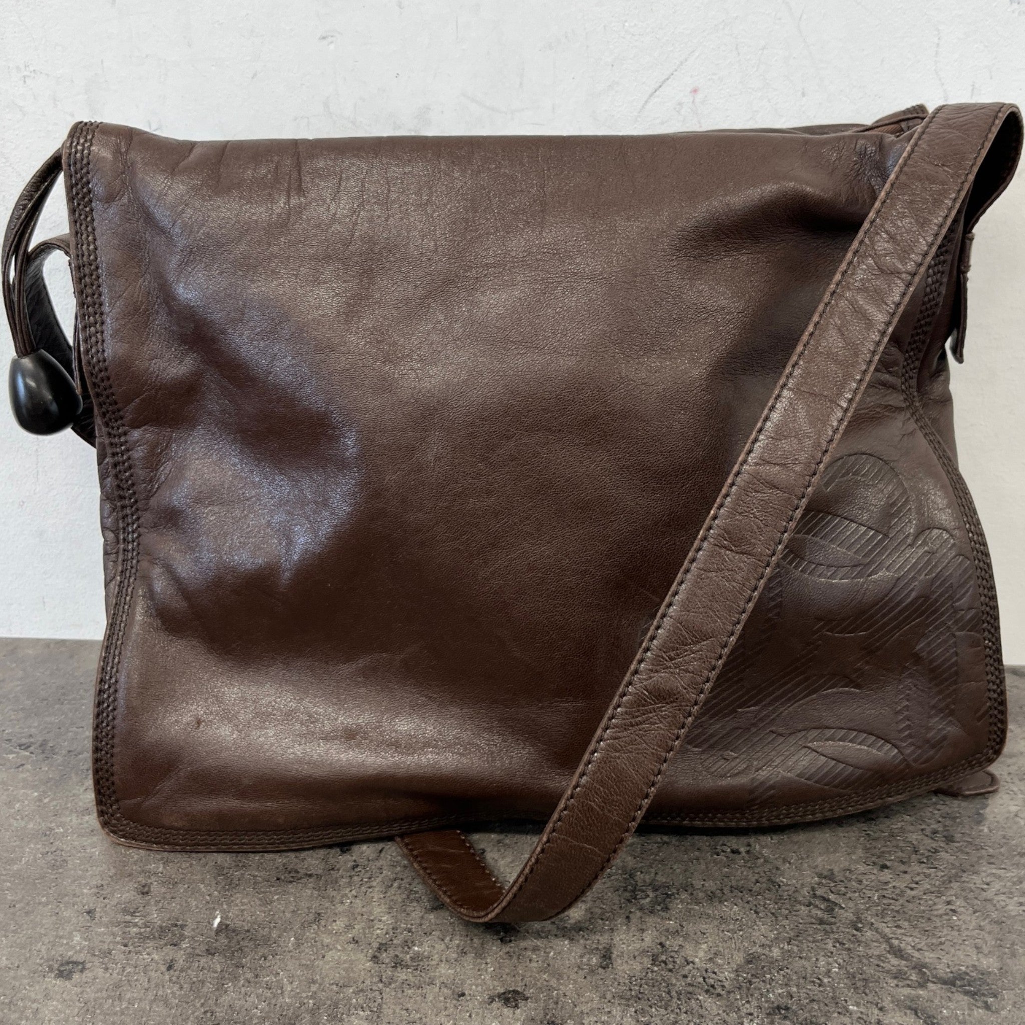 Women's Embossed Anagram Shoulder Bag Brown