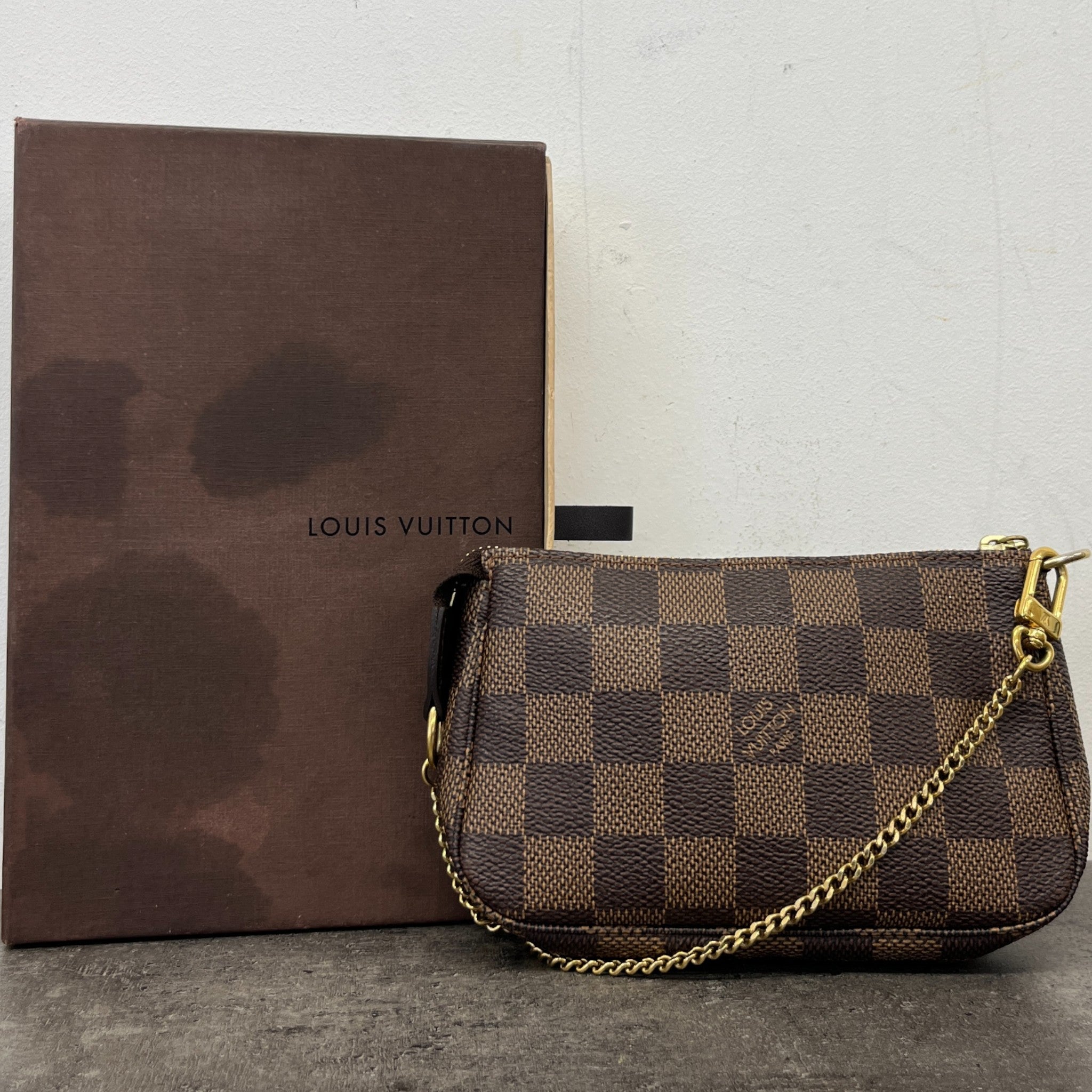 Women's Damier Ebene Mini Pochette Bag Brown