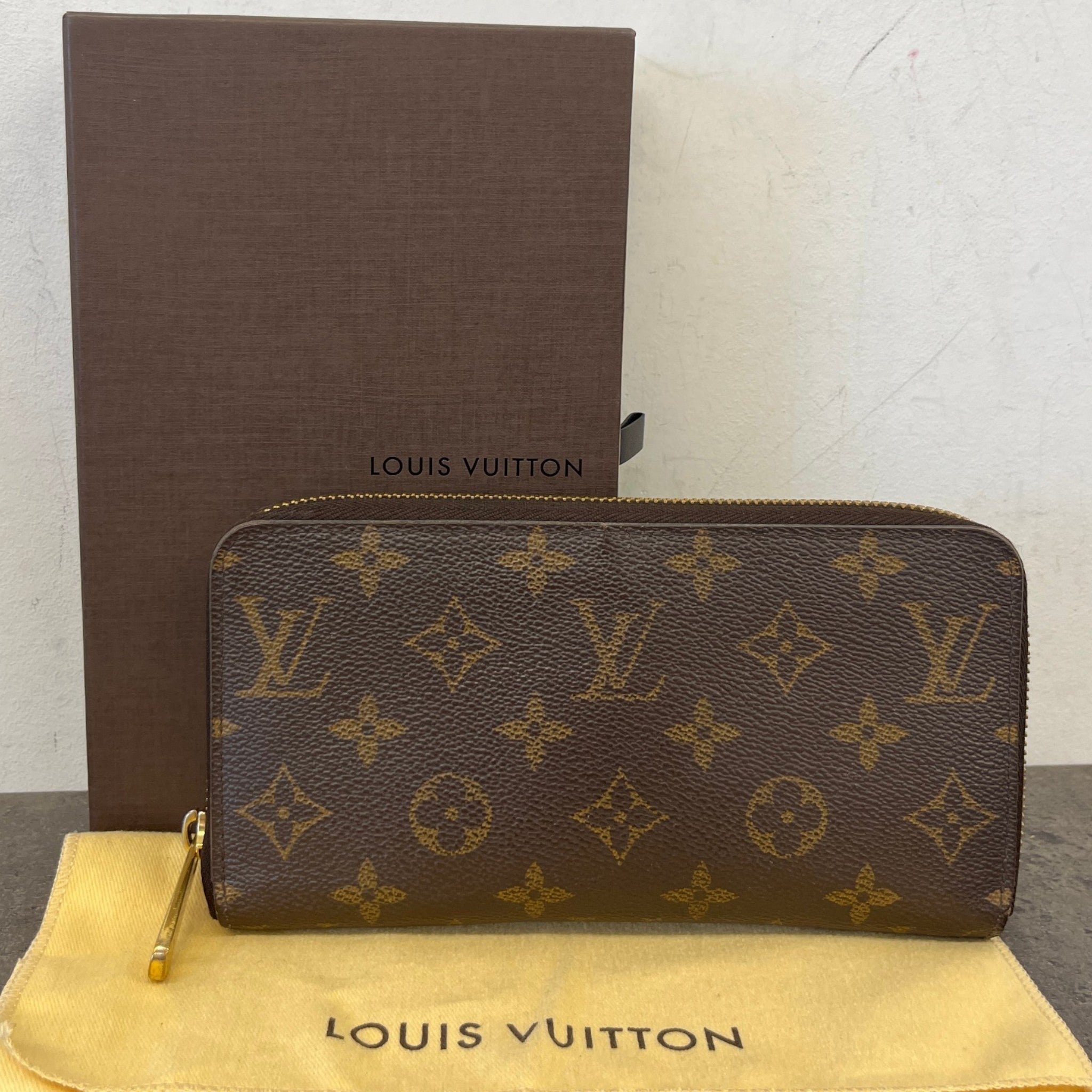 Women's Monogram Zippy Wallet Brown