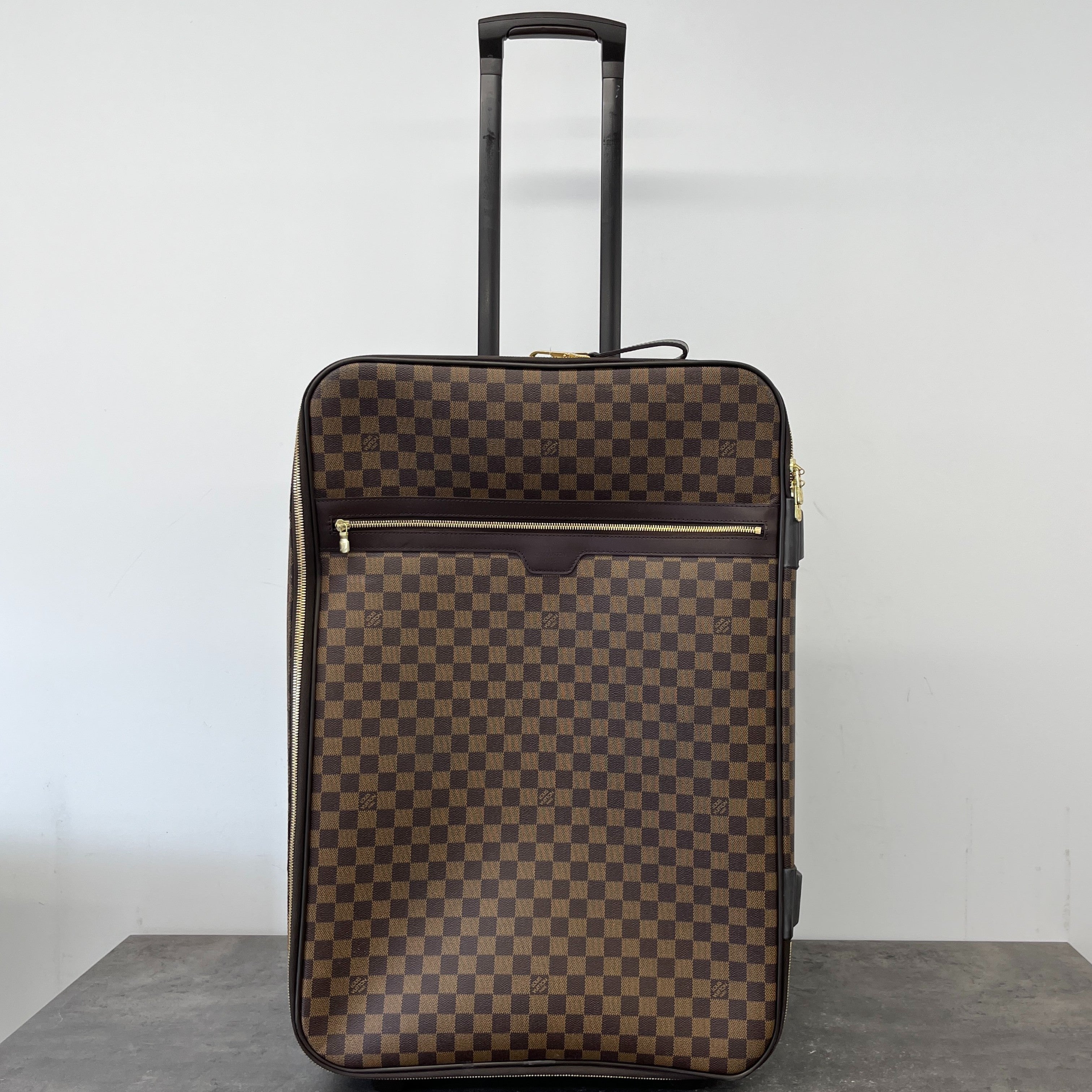 Men's Damier Ebene Pegase 65 Suitcase Brown