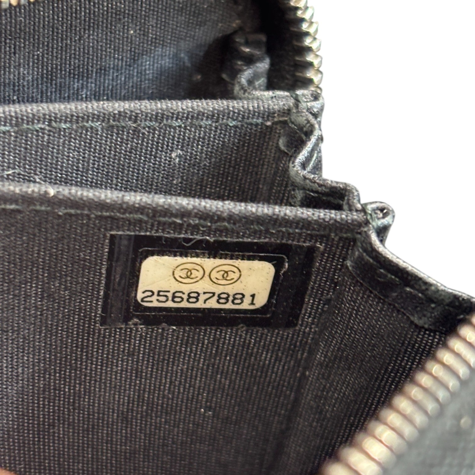 Women's Quilted Zip Around Tassel Purse Black