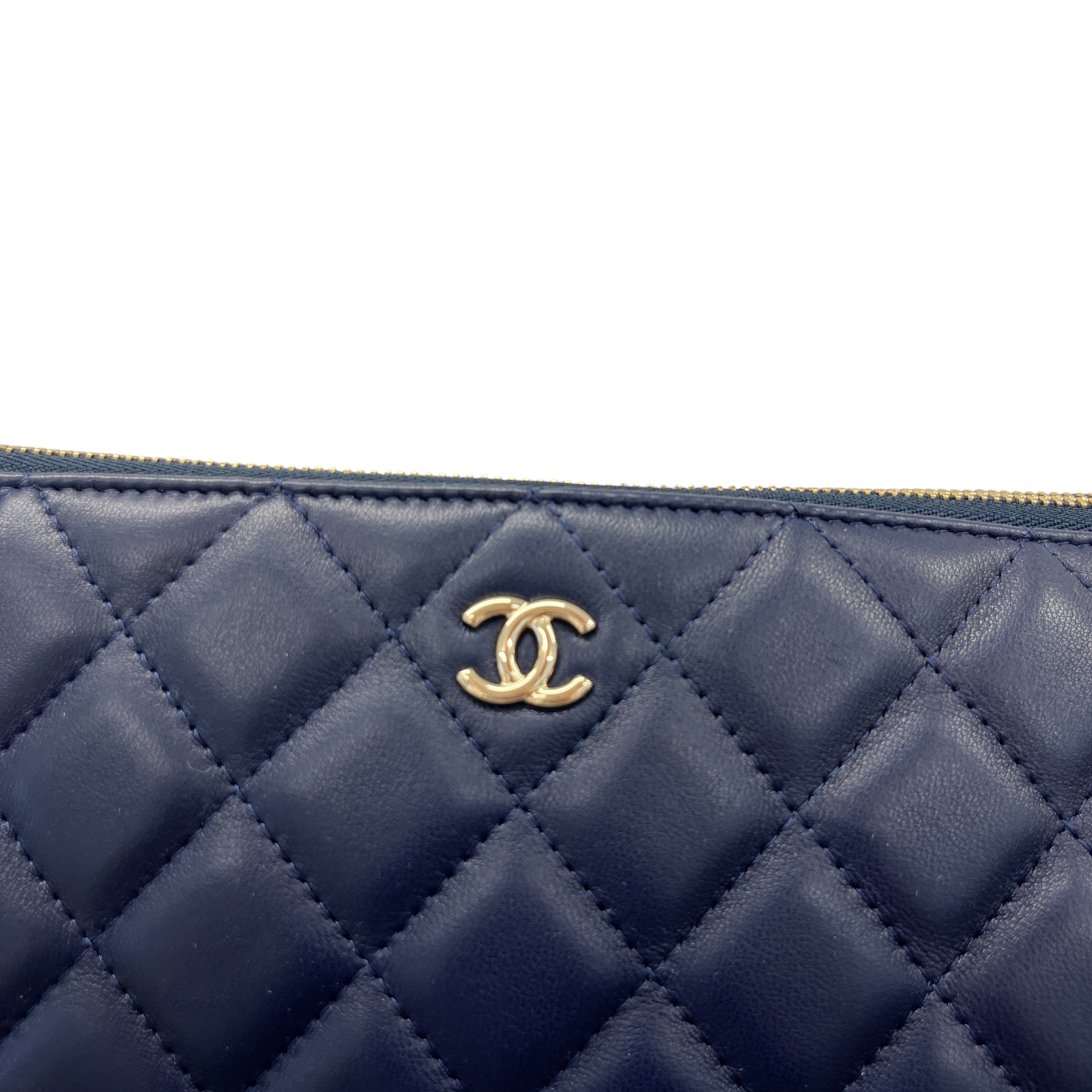 Women's Large Quilted Caviar O Case Clutch Navy