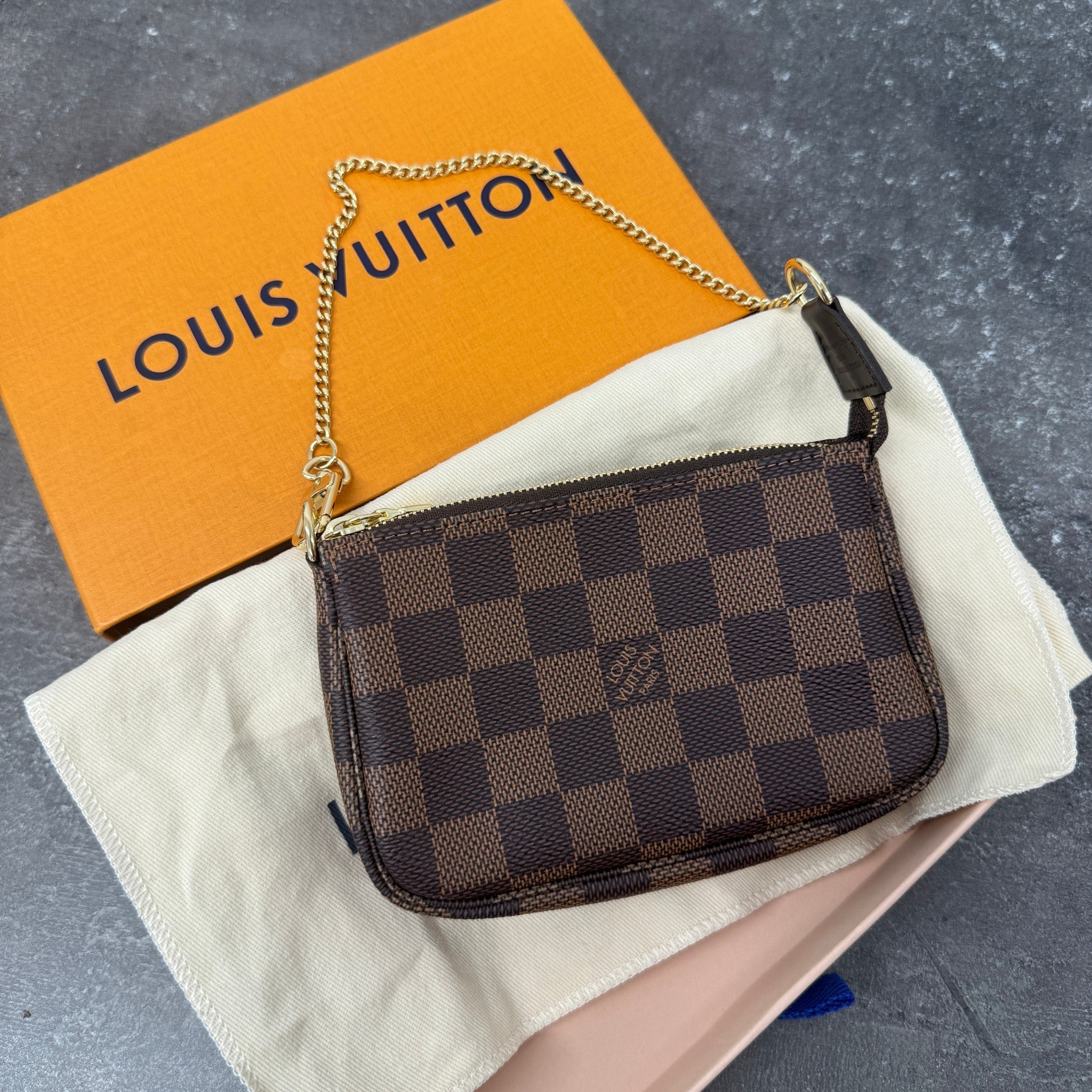 Women's Damier Ebene Mini Pochette Bag Brown