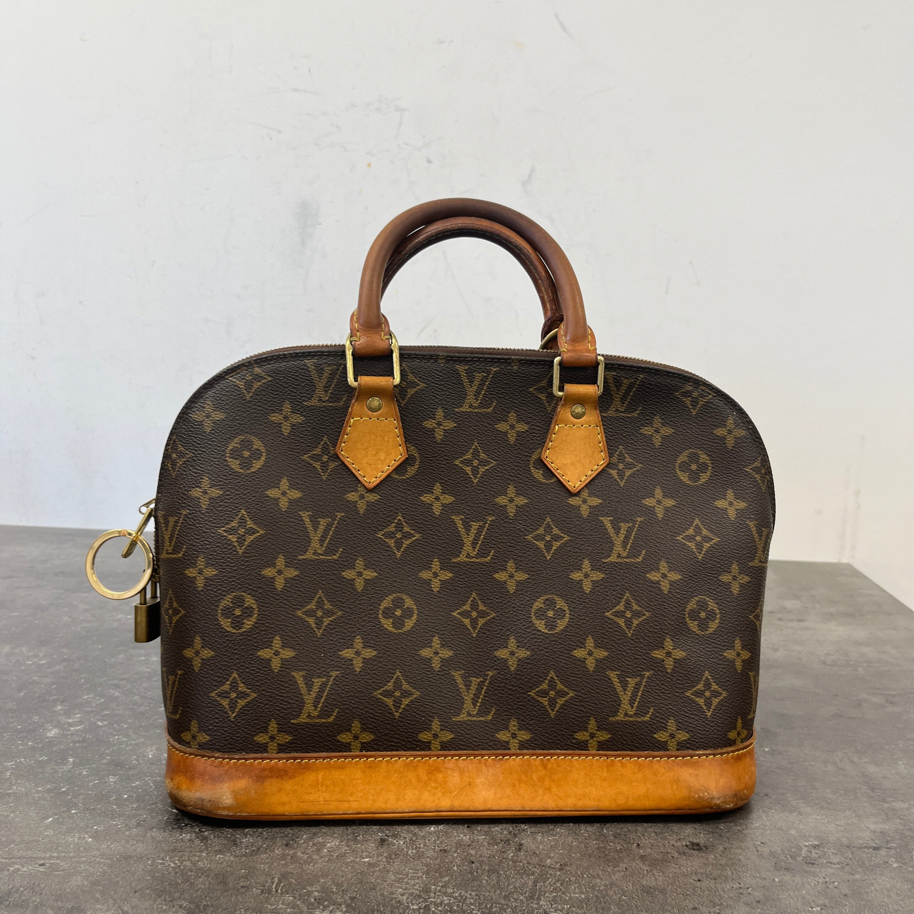 Women's Monogram Alma Handbag Brown