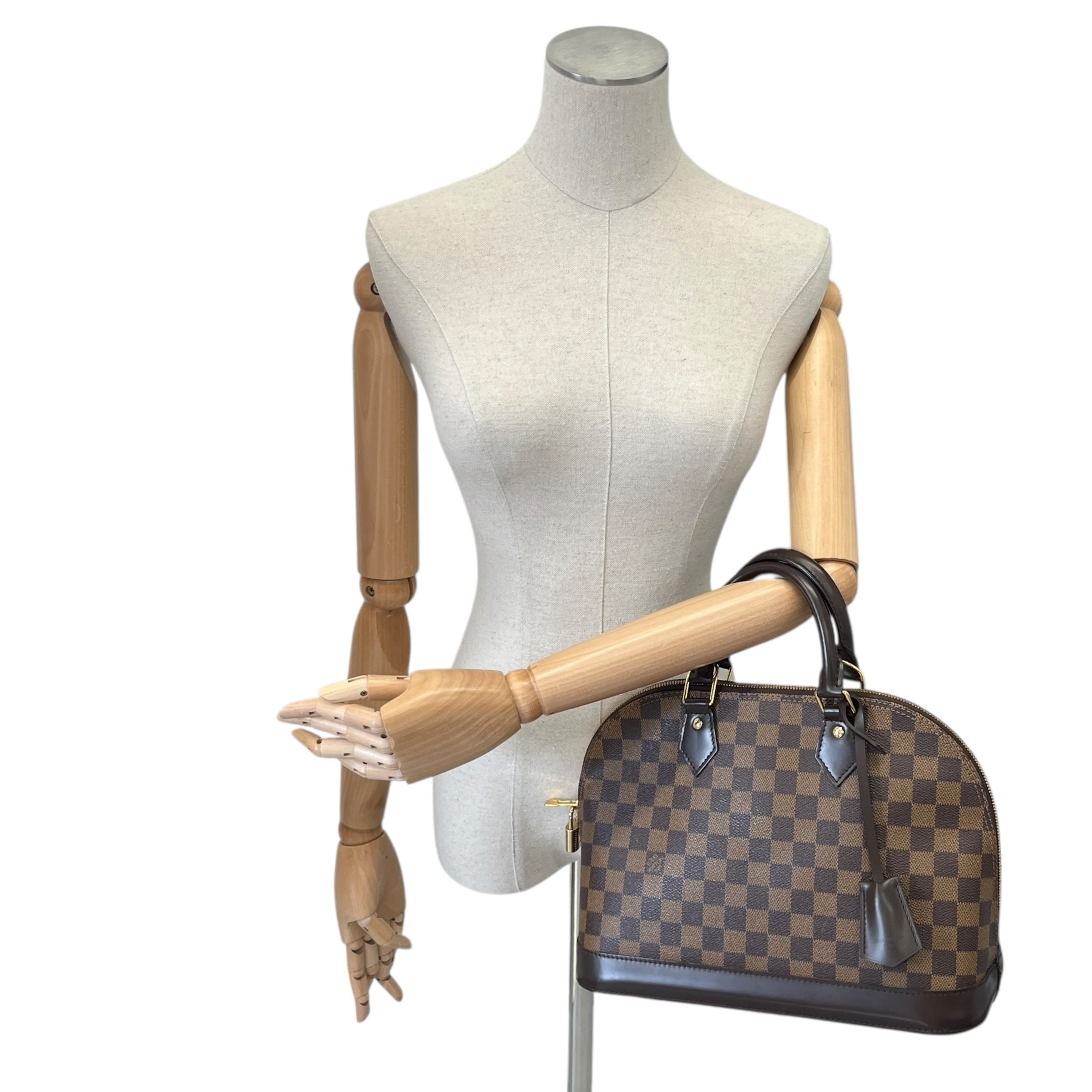 Women's Damier Ebene Alma Pm Bag Brown