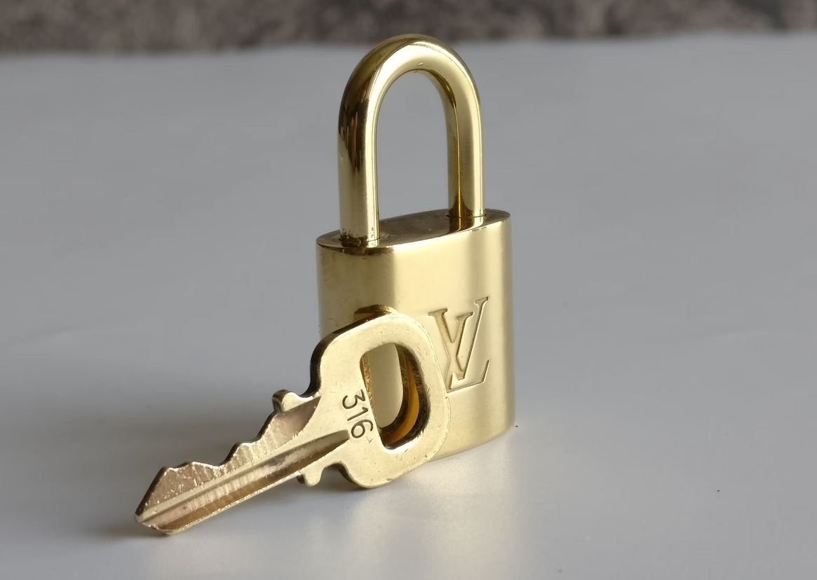 Louis Vuitton: The Story Behind the Unpickable Padlock – Label Source