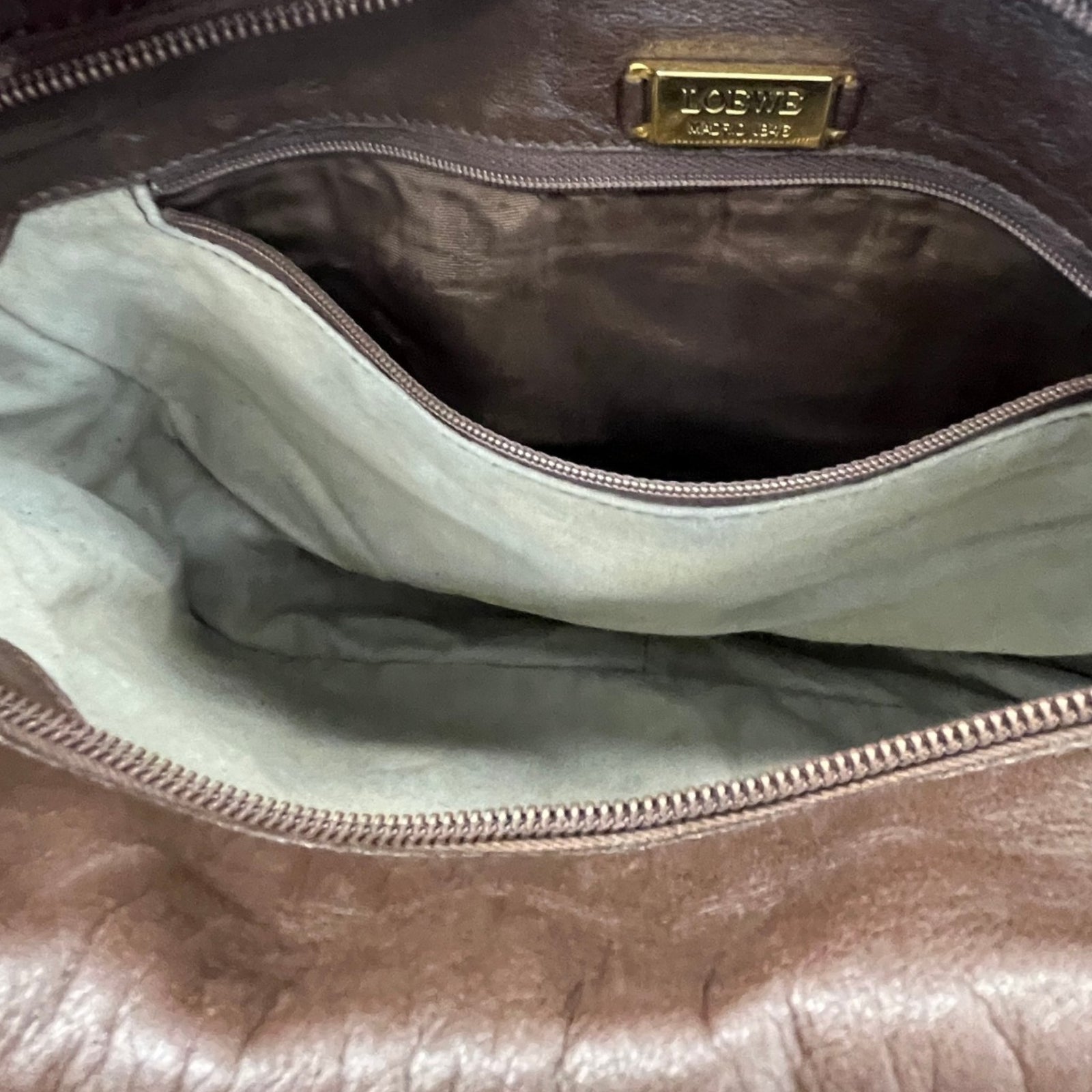 Women's Embossed Anagram Shoulder Bag Brown - Photo 10