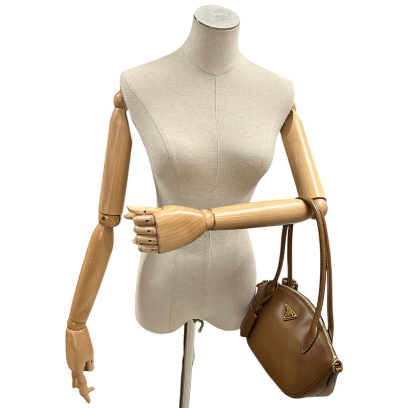 Prada Women's Plaque Logo Handbag Brown
