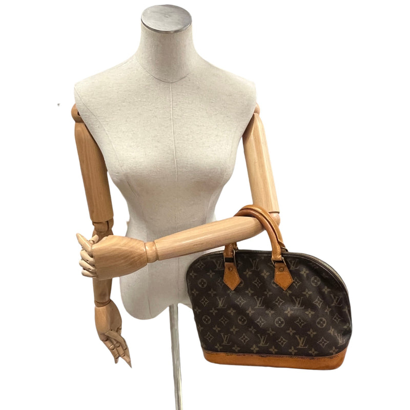 Women's Monogram Alma PM Handbag Brown