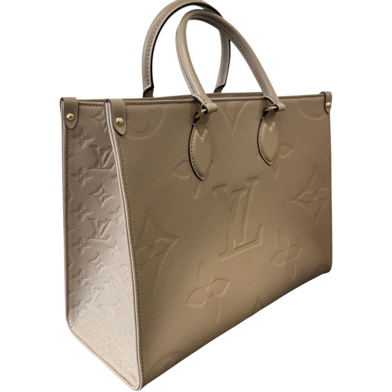 Women's Monogram Empreinte OnTheGo MM Handbag Beige