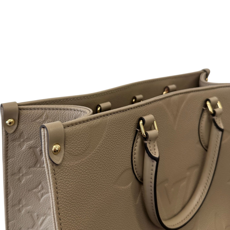 Women's Monogram Empreinte OnTheGo MM Handbag Beige