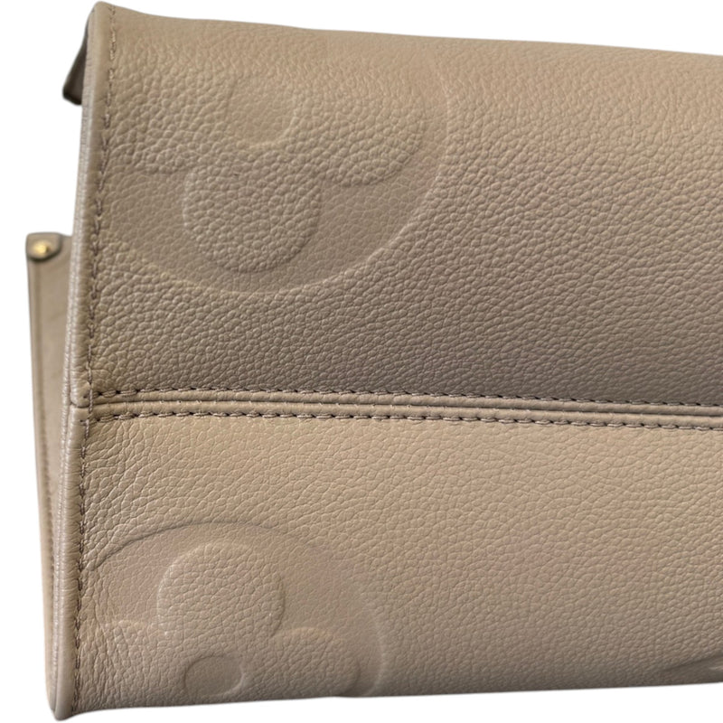 Women's Monogram Empreinte OnTheGo MM Handbag Beige