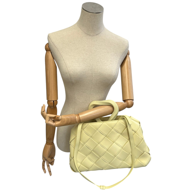 Women's Woven Intrecciato Top Handle Grasp Bag Yellow