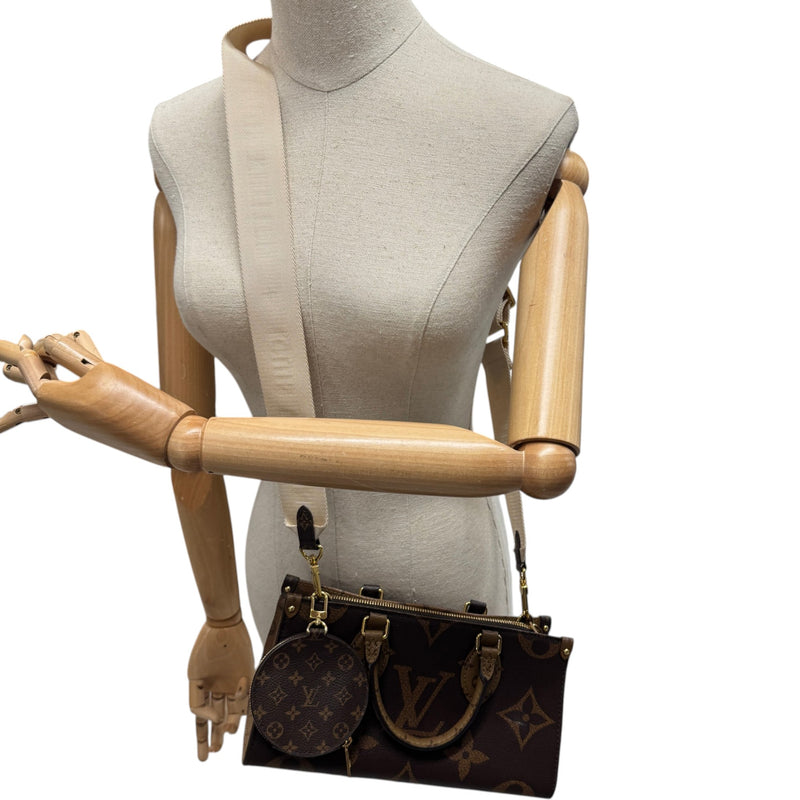 Women's Reverse Monogram On The Go East West Handbag Brown